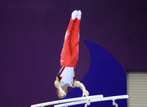 Azərbaycan gimnastı Oleq Stepko Avropa Oyunlarında paralel qollarda hərəkətlərdə qızıl medal qazandı. Bakı, Azərbaycan, 20 iyun 2015